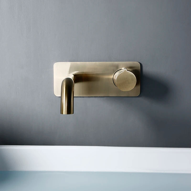 Brushed gold wall mounted basin tap side view