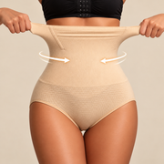 Woman demonstrating the stretch of beige high waist shapewear