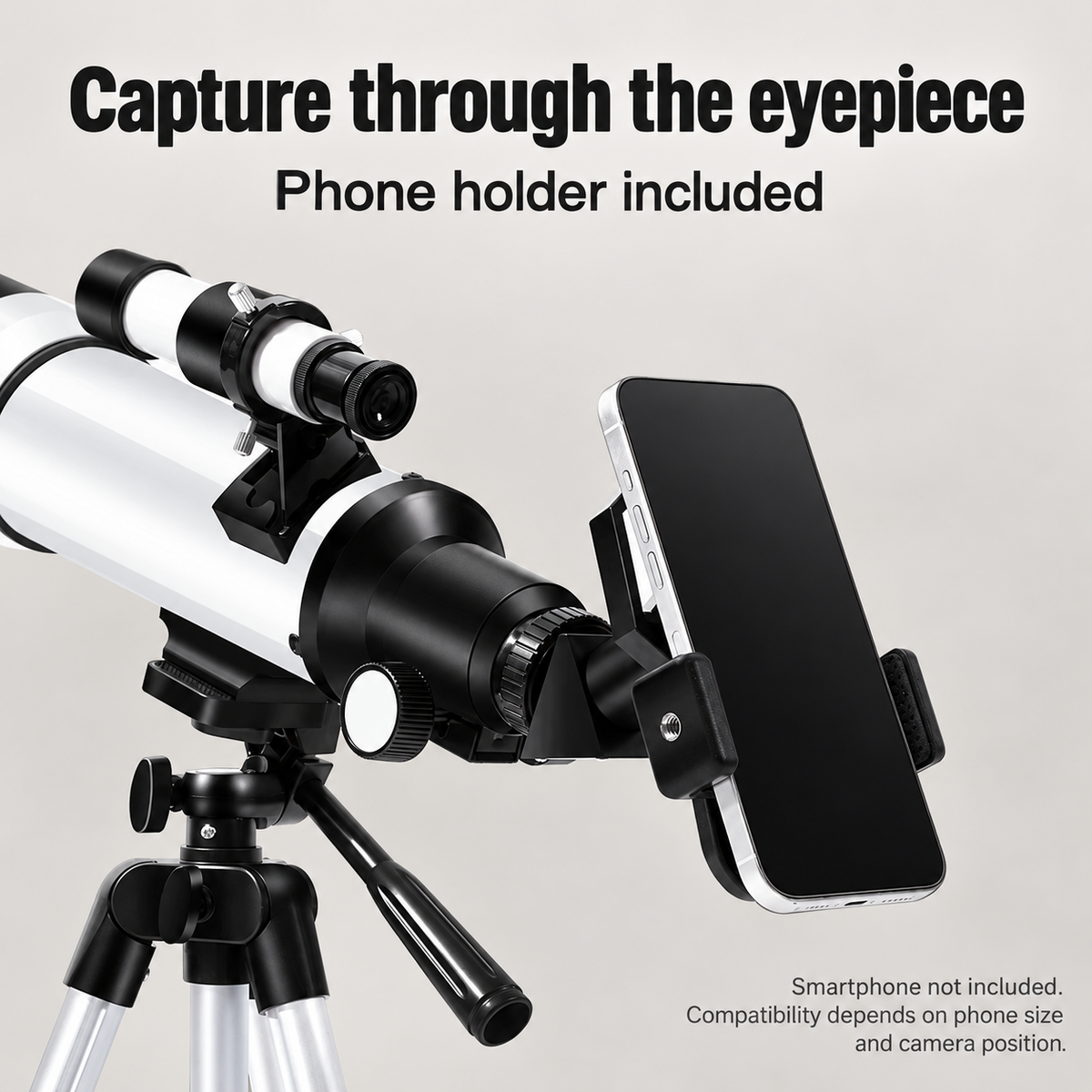 Original telescope phone holder mounted at the eyepiece; smartphone not included